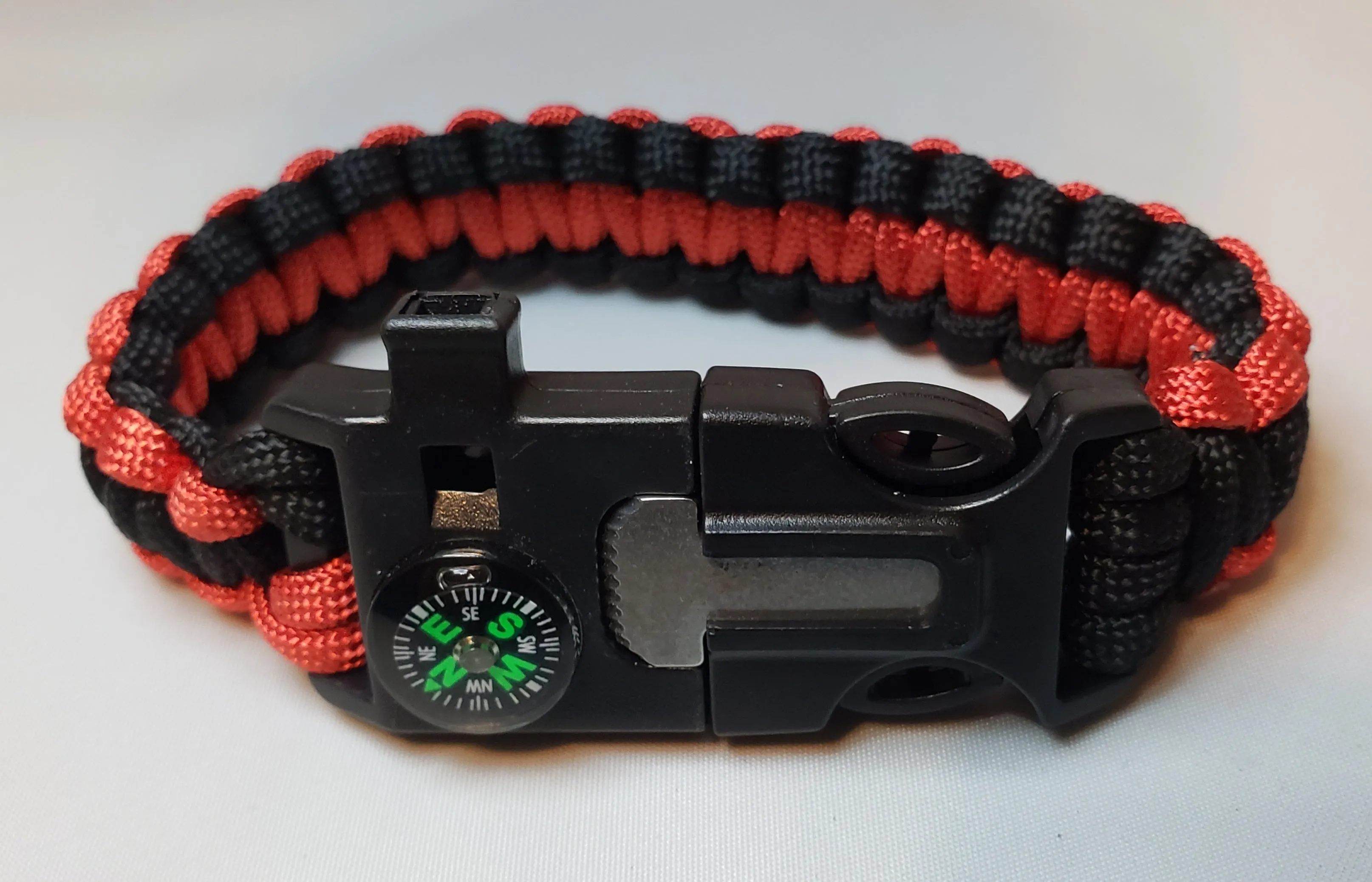 SURVIVAL BRACELET. 5 in 1 with Paracord, Compass, Fire Starter, Whistle & Scraper/Knife. 8.5" in various colors 