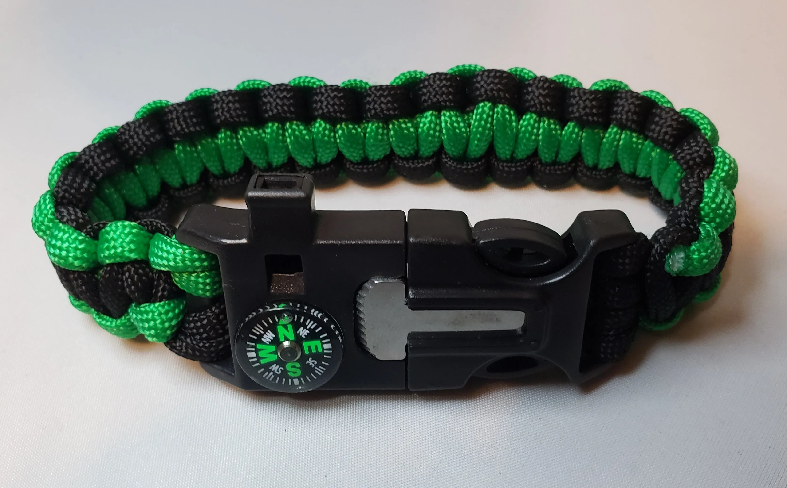 SURVIVAL BRACELET. 5 in 1 with Paracord, Compass, Fire Starter, Whistle & Scraper/Knife. 8.5" in various colors 